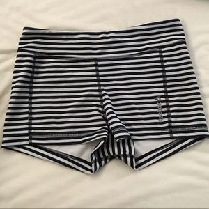 Black and white striped reebok shorts. Size medium